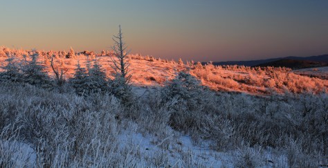 Dark pink and orange light on the mountain